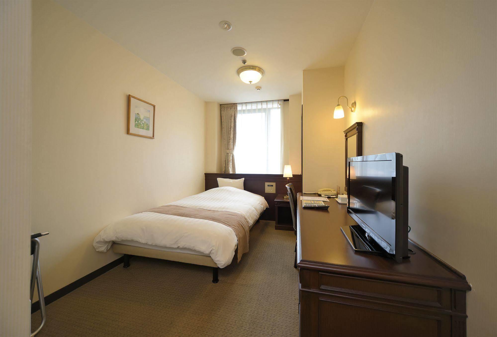 Amami Sunplaza Hotel Экстерьер фото