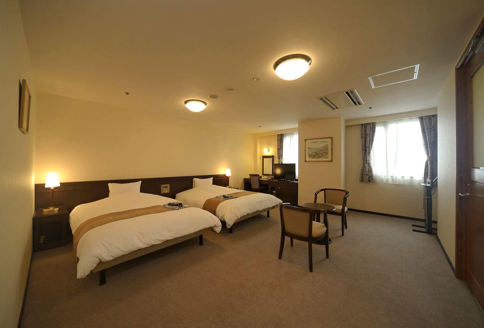 Amami Sunplaza Hotel Экстерьер фото