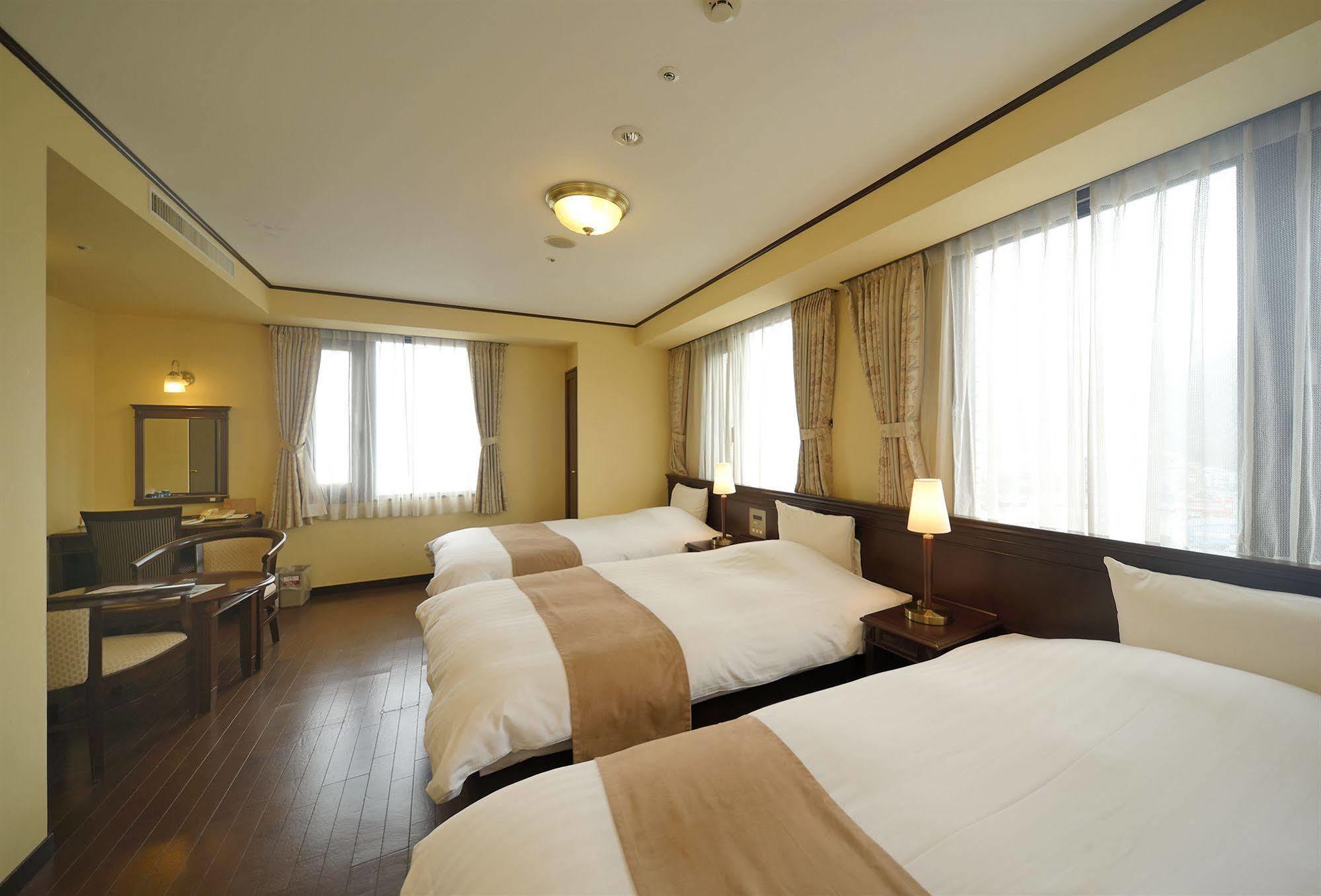 Amami Sunplaza Hotel Экстерьер фото